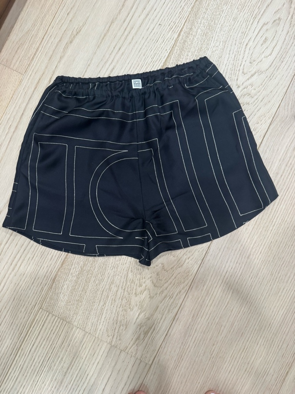 Toteme Black Silk Shorts with Contrast Stitching